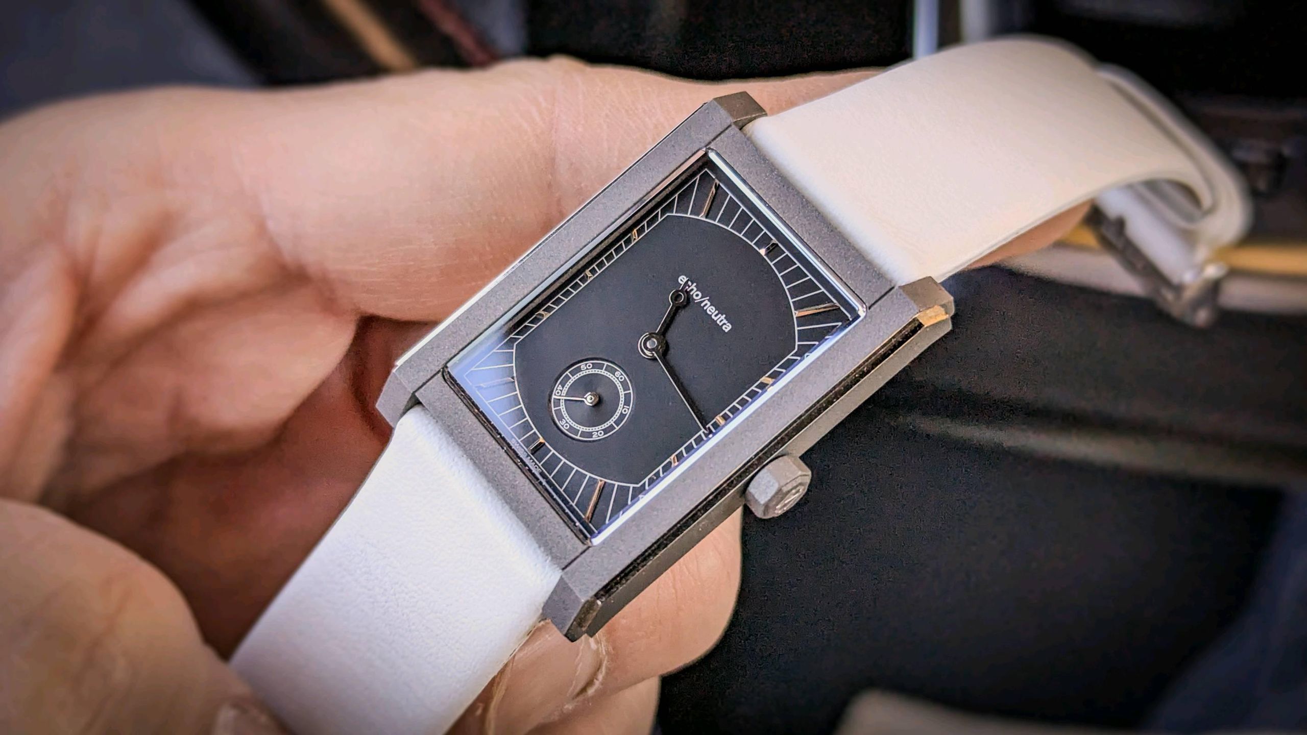 Echo/Neutra Rivanera Black Dial with a plain white leather 