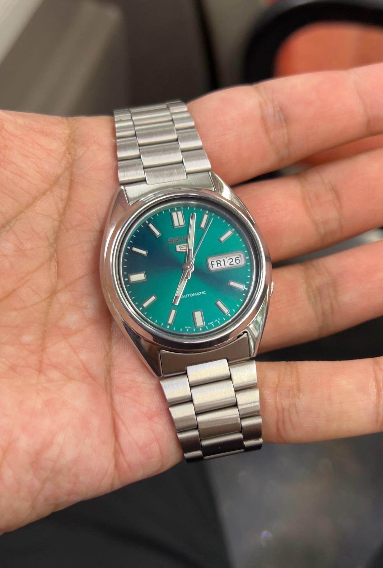 Seiko SNX447: A Timeless Masterpiece with a Mesmerizing Green Dial
