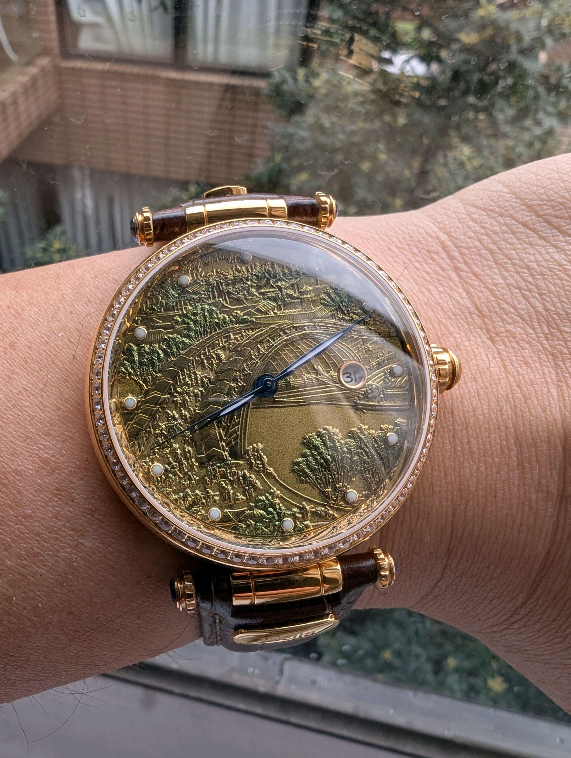 Diella matching automatic watches with engraved Chinese scenic motif on dial
