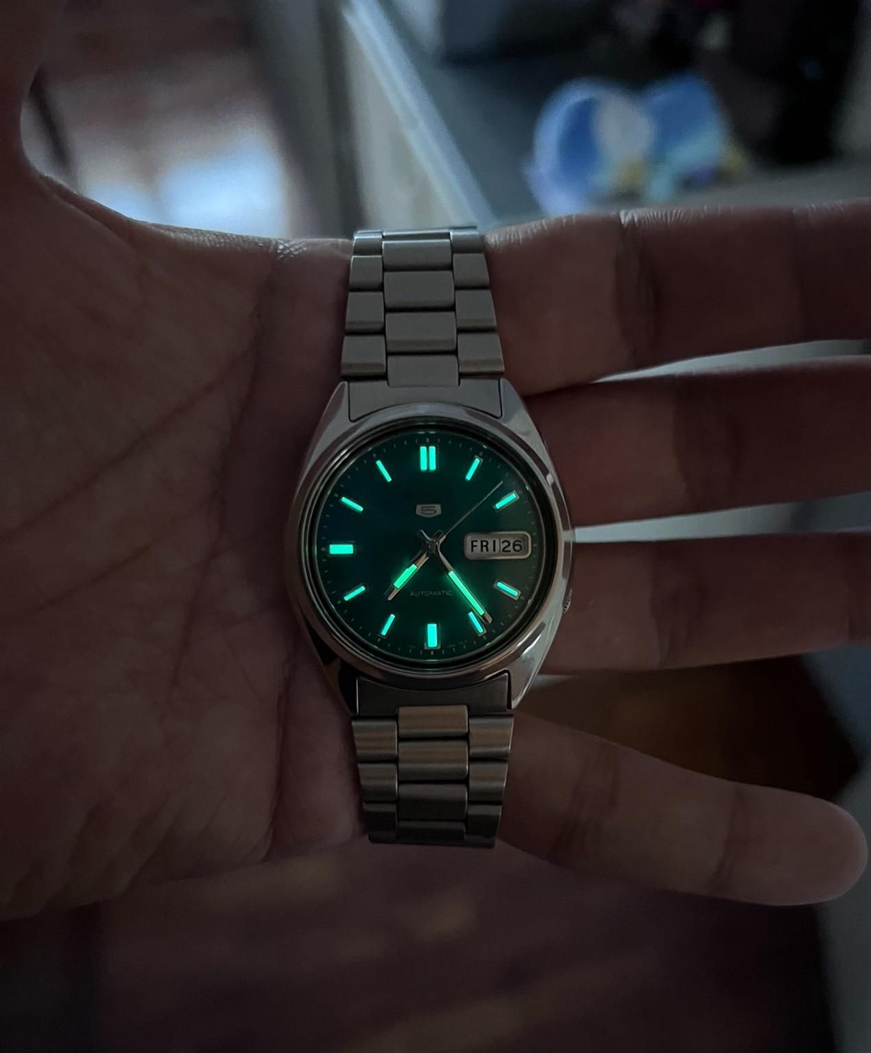 Seiko SNX447: A Timeless Masterpiece with a Mesmerizing Green Dial