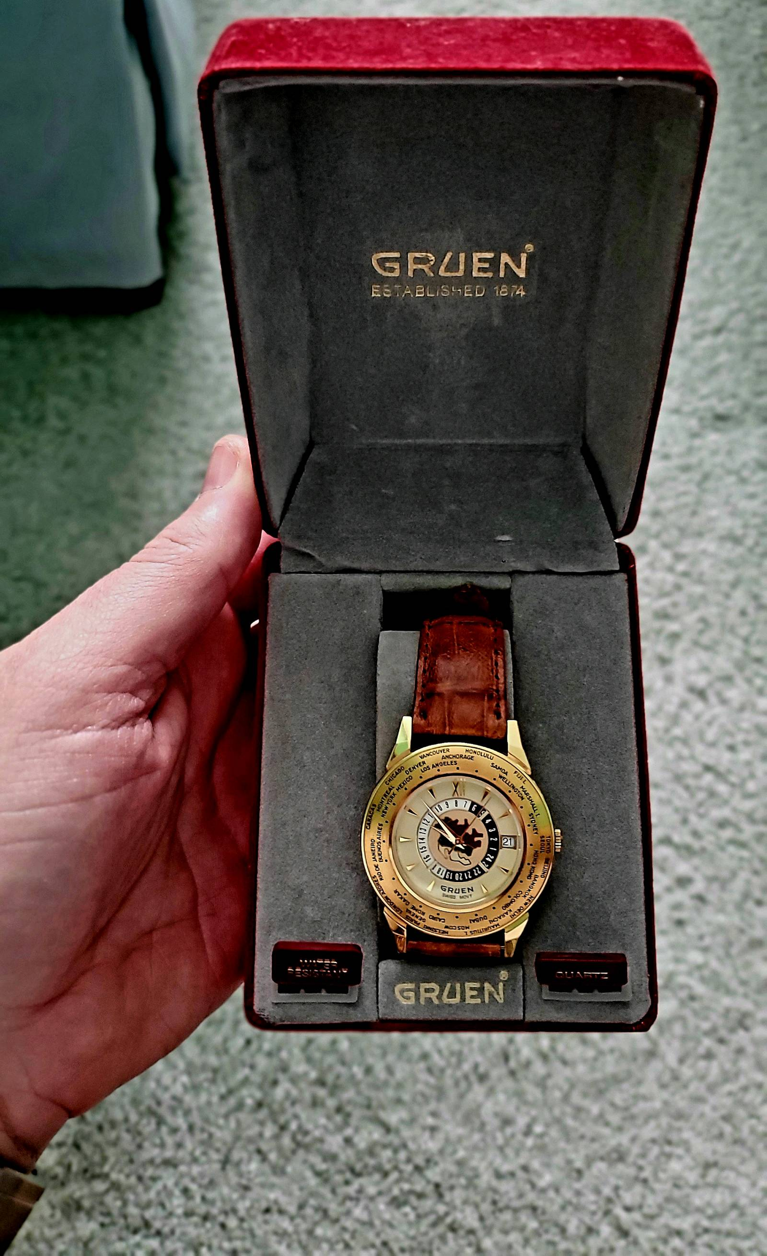 Can anyone help me identify this Gruen quartz world timer ⌚? | WatchCrunch